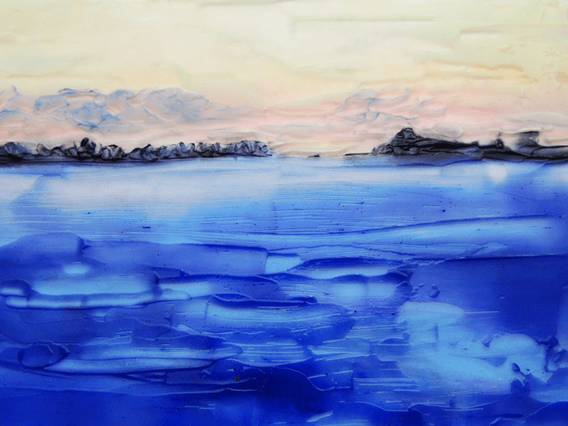 Still from TAMRINATOR — deep blue sea beneath a pale streaked sky.